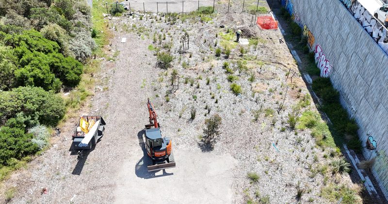 Excavator and truck on a council work site